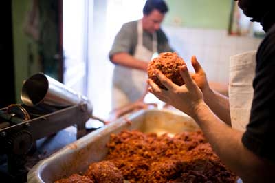 Butchers making Sausages